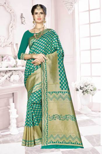 Add This Very Pretty Silk Based Saree To Your Wardrobe In Green Color. This Saree Is Fabricated On Banarasi Art Silk Paired With Art Silk Fabricated Blouse. It Is Beautified With Floral Weave All Over It