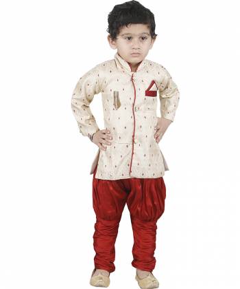 This Festive Season Give Your Child A Cute Traditional Look Wearing This Designer Readymade Sherwani Which Is Cotton Silk Based. Its Fabric Has Rich Feel And Light In Weight, Also It Is Available In All Sizes. Choose As Per The Desired Fit And Comfort. Buy Now.