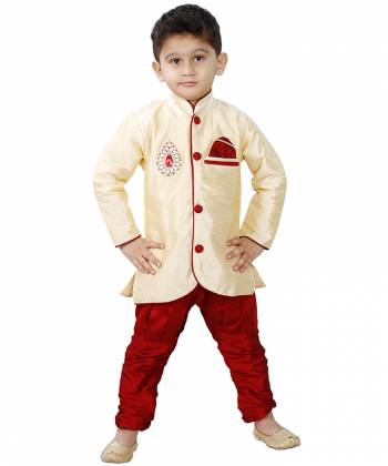 This Festive Season Give Your Child A Cute Traditional Look Wearing This Designer Readymade Sherwani Which Is Cotton Silk Based. Its Fabric Has Rich Feel And Light In Weight, Also It Is Available In All Sizes. Choose As Per The Desired Fit And Comfort. Buy Now.