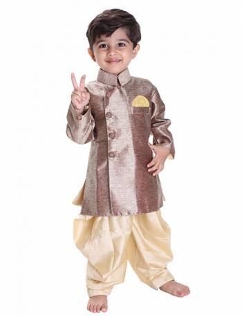 This Festive Season Give Your Child A Cute Traditional Look Wearing This Designer Readymade Sherwani Which Is Cotton Silk Based. Its Fabric Has Rich Feel And Light In Weight, Also It Is Available In All Sizes. Choose As Per The Desired Fit And Comfort. Buy Now.