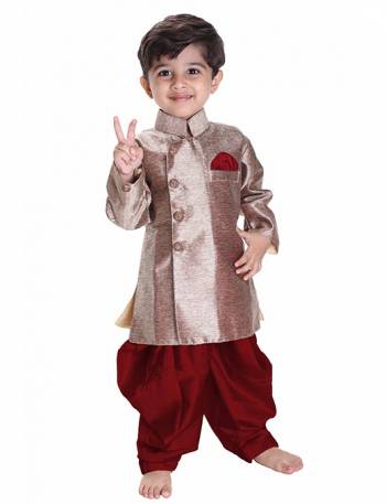 This Festive Season Give Your Child A Cute Traditional Look Wearing This Designer Readymade Sherwani Which Is Cotton Silk Based. Its Fabric Has Rich Feel And Light In Weight, Also It Is Available In All Sizes. Choose As Per The Desired Fit And Comfort. Buy Now.