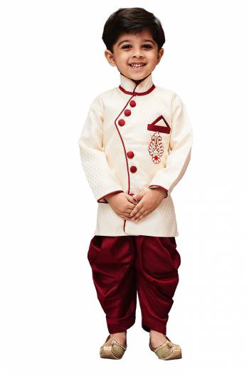 This Festive Season Give Your Child A Cute Traditional Look Wearing This Designer Readymade Sherwani Which Is Cotton Silk Based. Its Fabric Has Rich Feel And Light In Weight, Also It Is Available In All Sizes. Choose As Per The Desired Fit And Comfort. Buy Now.