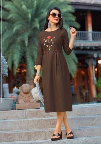 Enhace Your Personality Wearing This Designer Readymade Kurti In Brown Color Fabricated Cotton Which IS Light Weight, Durable And Easy To Carry All Day Long.  Buy Now.