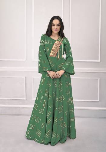 Add This Very Beautiful Designer Readymade Gown In Green Color For The Upcoming Festive Season. This Pretty Gown Is Fabricated On Rayon Which Is Soft Towards Skin And Easy To Carry All Day Long. 