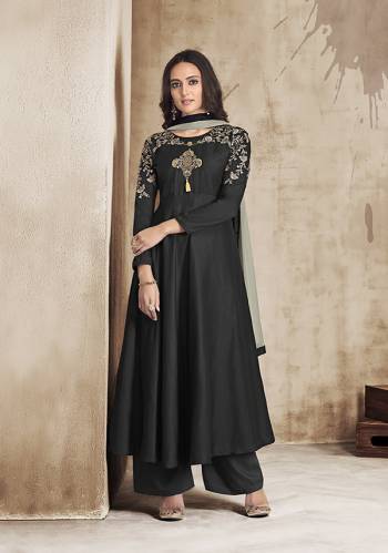 Enhance Your Personality In this Designer Readymade Suit In Black Colored Top and Plazzo Paired With Grey Colored Dupatta. This Pretty Suit Is Fabricated On Muslin Paired With Chiffon Fabricated Dupatta. 