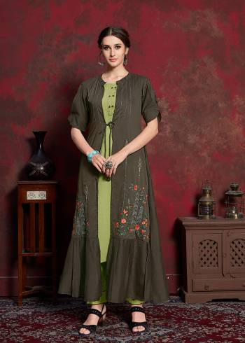 Celebrate This Festive Season With Beauty And Comfort Wearing This Designer Readymade Kurti In Light Green Colored Inner Paired With Dark Green Colored Jacket. Its Inner Is Fabricated On Rayon cotton Paired With Muslin Fabricated Jacket. Its Rich And Subtle Color Pallete Will Earn You Lots Of Compliments From Onlookers. 