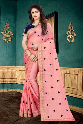 Look Pretty In This Lovely Designer Saree In Pink Color Paired With Contrasting Navy Blue Colored Blouse. This Pretty Saree Is Fabricated On Georgette Paired With Brocade Fabricated Blouse. It Is Beautified With Heavy Embroidered Lace Border And Butti All Over It. It Has Attractive Georgette Fabric With Glitter Padding. Buy Now.