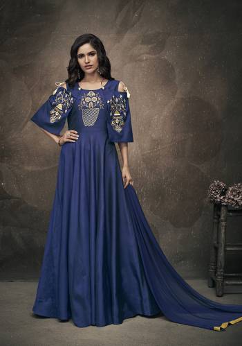 Enhance Your Personality Wearing This Heavy Designer Readymade Gown In Navy Blue Color Which Comes A Very Pretty Navy Blue Colored Dupatta. The Gown IS Fabricated On Tafeta Art Silk Beautified With Embroidery Over Yoke And Sleeves. Buy This Designer Piece Now.