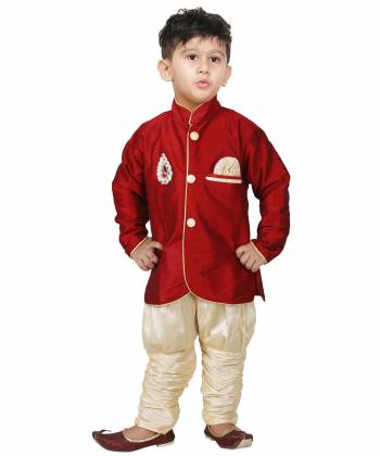 This Festive Season Give Your Child A Cute Traditional Look Wearing This Designer Readymade Sherwani With Bottom Which Is Cotton Silk Based. Its Fabric Has Rich Feel And Light In Weight, Also It Is Available In All Sizes. Choose As Per The Desired Fit And Comfort. Buy Now.