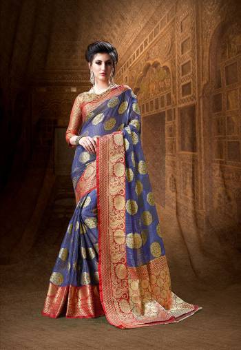 Attract All Wearing This Designer Saree In Voilet Color Paired With Contrasting Red Colored Blouse. This Saree And Blouse Are Fabricated On Art Silk Beautified With Heavy Weave All Over It. Buy This Pretty Attractive Saree Now.