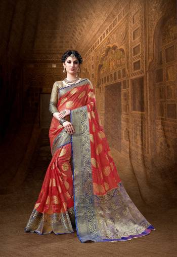 Grab This Very Beautiful Designer Silk Based Saree In Red Color Paired With contrasting Nviolet Colored Blouse. This Saree And Blouse Are Fabricated On Art Silk Beautified With Weave All Over It. 