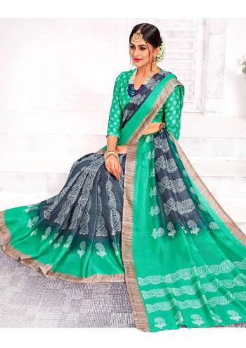 Add Some Casuals Or Semi-Casuals Wear With This Pretty Saree In Grey Color Paired With Contrasting Sea Green Colored Blouse. This Saree And Blouse Are Fabricated On Linen Silk Beautified With Prints All Over. Buy Now.