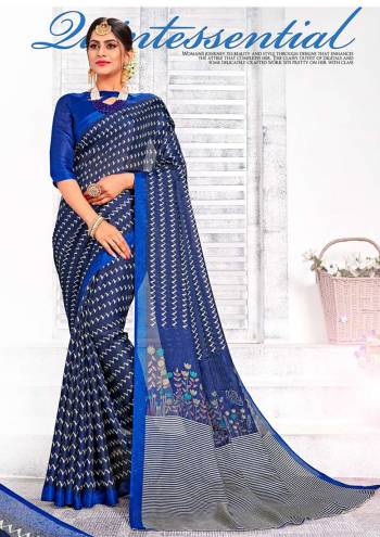 Attract All In This Printed Navy Blue Colored Saree Paired With Royal Blue Colored Blouse. This Saree And Blouse are Fabricated On Linen Silk Beautified Prints All Over. Its Fabric Gives A Rich Look And Is Light In Weight To Carry All Day Long. 