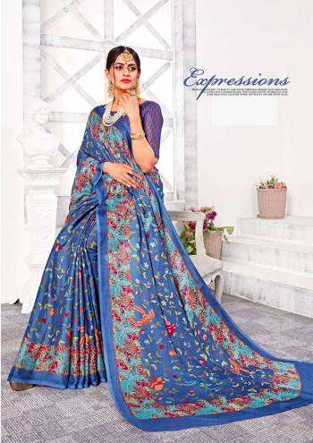 Add Some Casuals Or Semi-Casuals Wear With This Pretty Saree In Blue Color Paired With Blue Colored Blouse. This Saree And Blouse Are Fabricated On Linen Silk Beautified With Prints All Over. Buy Now.