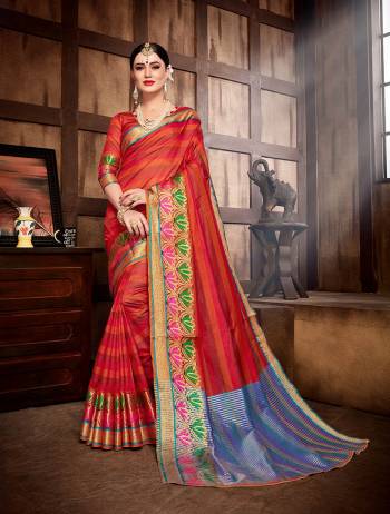 Adorn The Pretty Angelic Look In This Designer Silk Based Saree In Red. This Lovely Saree And Blouse Are Fabricated On Banarasi Art Silk Beautified With Weave Over The Border. 