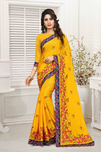 Celebrate This Festive Season with Beauty And Comfort Wearing This Designer Heavy Saree In Musturd Yellow Color. This Pretty Heavy Embroidered Saree And Blouse Are Fabricated On Chiono Which Is Light Weight And Also Gives An Elegant Look To Your Personality. 