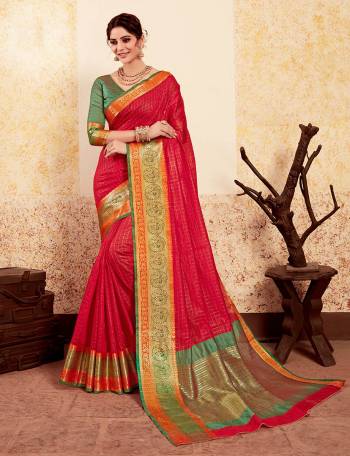 Adorn The Preety Angelic Look In This Very Pretty Ethnic Color Pallete Silk Based Saree In Red Color Paired With Contrasting Green Colored Blouse. This Saree And Blouse Are Fabricated On Banarasi Art Silk Which Also Gives A Rich Look To Your Personality.