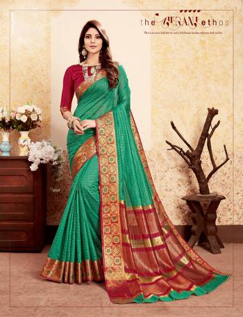 Celebrate This Festive Season With Beauty And Comfort Wearing This Designer Silk Based Saree In Sea Green Color Paired With Contrasting Maroon Colored Blouse. This Saree And Blouse Are Fabricated On Banarasi Art Silk Beautified With Weave. Buy Now.