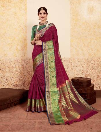 For A Royal Look, Grab This Rich Looking Silk Based Saree In Magenta Pink Color Paired With Contrasting Dark Green Colored Blouse. This Saree And Blouse Are Fabricated On Banarasi Art Silk Beautified with Weave All Over. 