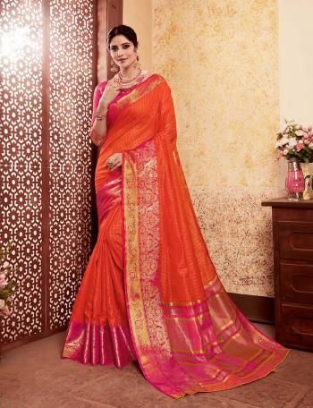 Adorn The Preety Angelic Look In This Very Pretty Ethnic Color Pallete Silk Based Saree In Orange Color Paired With Contrasting Rani Pink Colored Blouse. This Saree And Blouse Are Fabricated On Banarasi Art Silk Which Also Gives A Rich Look To Your Personality.