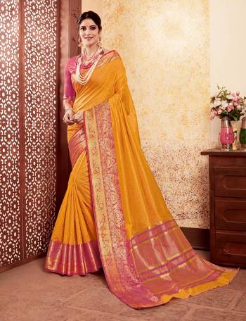 Celebrate This Festive Season With Beauty And Comfort Wearing This Designer Silk Based Saree In Musturd Yellow Color Paired With Contrasting Pink Colored Blouse. This Saree And Blouse Are Fabricated On Banarasi Art Silk Beautified With Weave. Buy Now.