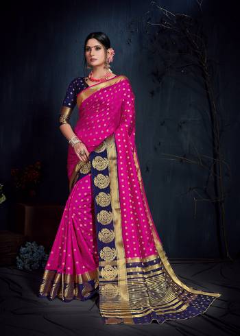 Shine Bright In this Attractive Color Pallete With This Nylon Silk Based Saree In Rani Pink Color Paired With Contrasting Navy Blue Colored Blouse. It Is Beautified With Attractive Weave Giving It A More pretty Look. 