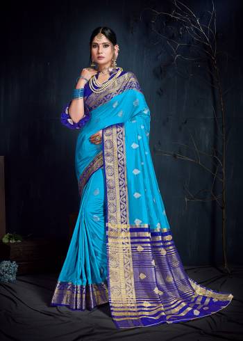 Flaunt Your Rich And Elegant Taste In This Subtle Blue Colored Saree Paired With Royal Blue Colored Blouse. This Saree And Blouse Are Fabricated On Nylon Art Silk Beautified With Weave. Its Rich Fabric And Subtle Color Pallete Will Definitely Earn You Lots Of Compliments From Onlookers. 