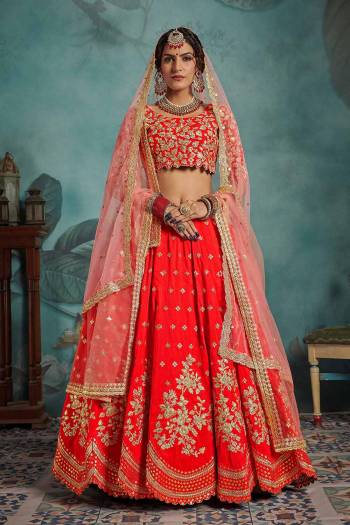 Get Ready For Your D-Day With This Heavy Designer Lehenga Choli In Red Color Paired With Baby Pink Colored Dupatta. Its Blouse And Lehenga Are Fabricated On Art Silk Paired With Two Net Dupattas. Its Lovely Bridal Color Pallete Will Earn You Lots Of Compliments From Onlookers. 