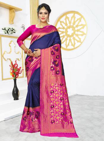 Celebrate This Festive Season In Proper Traditional Look Wearing This Silk Based Saree In Royal Blue Color Paired With Contrasting Dark Pink Colored Blouse. This Saree And Blouse are Fabricated On Banarasi Art Silk Beautified With Bold Motif Weave. 