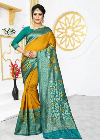 Grab This Rich And Elegant Looking Silk Based Designer Saree In Musturd Yellow Color Paired With Sea Green Colored Blouse. This Saree And Blouse are Fabricated On Banarasi Art Silk Beautified With Weave Over Its Attractive Broad Border. 