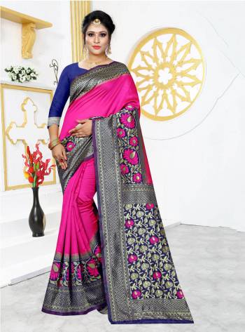 Celebrate This Festive Season In Proper Traditional Look Wearing This Silk Based Saree In Rani Pink Color Paired With Contrasting Royal Blue Colored Blouse. This Saree And Blouse are Fabricated On Banarasi Art Silk Beautified With Bold Motif Weave. 