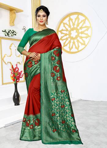 Grab This Rich And Elegant Looking Silk Based Designer Saree In Red Color Paired With Green Colored Blouse. This Saree And Blouse are Fabricated On Banarasi Art Silk Beautified With Weave Over Its Attractive Broad Border. 