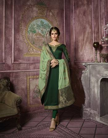 Go with The Lovely Sahdes Of Green With This Heavy Designer Straight Suit In Dark Green Color Paired With Light Green Colored Dupatta. Its Top Is Fabricated On Satin Georgette Paired With Santoon Bottom And  Georgette  Fabricated Heavy Embroidered Dupatta With Banarasi Art Silk Border. 