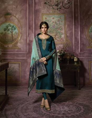 Here Is A Beautiful Designer Straight Suit In This Lovely Shades Of Blue In Teal Blue Colored Top And Bottom Paired With Light Blue Colored Dupatta. Its Top Is Fabricated On Satin Georgette Paired With Santoon Bottom And Georgette Dupatta With Banarasi Art Silk Broad Border. Buy This Suit Now.