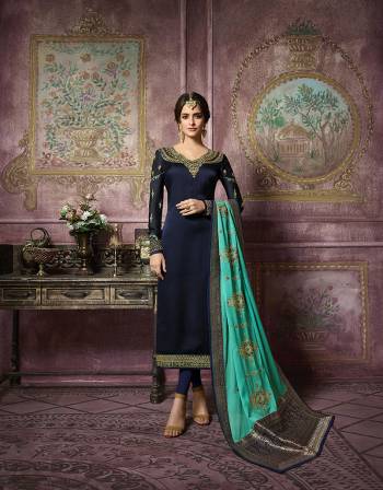 Enhance Your Perasonality Wearing This Designer Straight Suit In Navy Blue Color Paired With Turquoise Blue Colored Dupatta. Its Embroidered Top Is Fabricated On Satin Georgette Paired With Santoon Bottom And Georgette Fabricated Dupatta With Highlighted Border Of Banarasi Art Silk. 