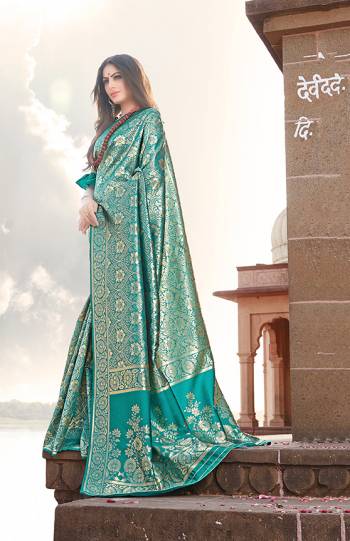 Get Ready For The Upcoming Festive And Wedding Season In A Proper Traditional Look With This Designer Saree In Turquoise Blue Color. This Saree And Blouse are Fabricated On Banarasi Art Silk Beautified with Heavy Weave All Over. Buy Now.