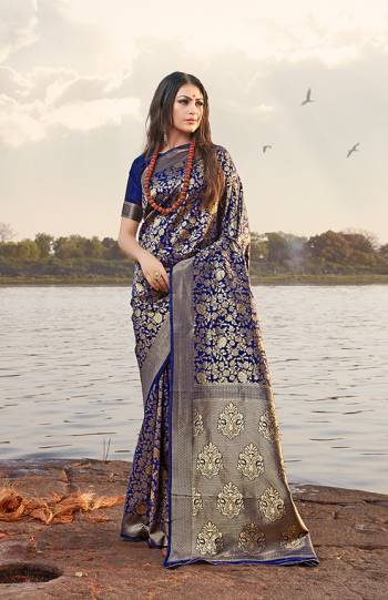 Get Ready For The Upcoming Festive And Wedding Season In A Proper Traditional Look With This Designer Saree In Navy Blue Color. This Saree And Blouse are Fabricated On Banarasi Art Silk Beautified with Heavy Weave All Over. Buy Now.