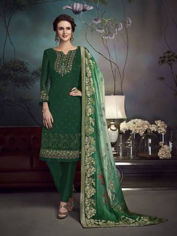 Add This Very Pretty Designer Suit To Your Wardrobe In Dark Green Color Paired With Green colored Dupatta. Its Top Is Fabricated On Satin Georgette Paired With Santoon Bottom And Jacquard Silk Dupatta. The Diamond Work And Printed Dupatta Suit Concept Will Give An Unqiue Look To Your Personality. 