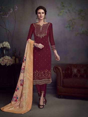 Look Pretty This Very Elegant Looking Designer Straight Suit In Maroon Color Paired With Contrasting Peach Colored Dupatta. Its Top Is Fabricated On Satin Georgette Paired With Santoon Bottom And Jacquard Silk Dupatta. The Highlight OF This Suit Is Its Attractive Diamond Work. 