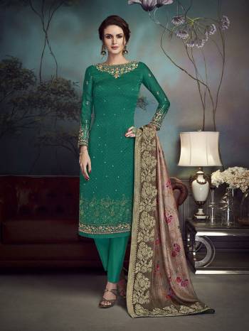 For A Pretty Elegant Look, Grab This Designer Straight Suit In Sea Green Color Paired With Brown Colored Dupatta. Its Top Is Fabricated On Satin Georgette Paired With Santoon Bottom And Jacquard Silk Dupatta. All Its Fabrics Are Soft Towards Skin And Ensures Superb Comfort All Day Long. 