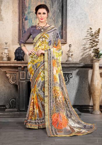 For Your Semi-Casuals, Grab This Printed Saree Paired With Plain Blouse. This Saree IS Fabricated On Chiffon Brasso Which IS Light Weight And Paired With Art Silk Fabricated Blouse. Buy Now.