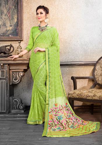 Pretty Simple and Elegant Saree IS Here For Your Semi-Casuals. This Pretty Saree Is Fabricated On Chiffon Brasso Paired With Art Silk Fabricated Blouse. It Is Beautified With Prints All over and Also It Is Light Weight And Easy To Carry All Day long. 