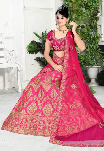 Here Is A Very Beautiful Heavy Designer Bridal Lehenga Choli In All Over Dark Pink. Its Blouse And Lehenga Are Fabricated On Satin Silk Paired With Net Fabricated Dupatta. It Is Beautified With Heavy Embroidery Giving It An Attractive Look. 