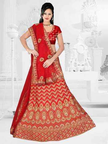 Get Ready For Your D-Day With This Very Beautiful And Evergreen Color For A Bridal Wear With This Designer Lehenga Choli In Red Color. This Heavy Embroidered Lehenga Choli Is Satin Silk Based Paired With Net Fabricated Dupatta. Its Lovely Bright Color And Heavy Embroidery Will Add Pretty Glam Look.