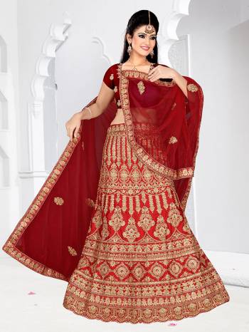 Get Ready For Your D-Day With This Very Beautiful And Evergreen Color For A Bridal Wear With This Designer Lehenga Choli In Red Color. This Heavy Embroidered Lehenga Choli Is Satin Silk Based Paired With Net Fabricated Dupatta. Its Lovely Bright Color And Heavy Embroidery Will Add Pretty Glam Look.