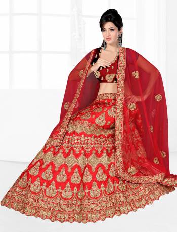 Get Ready For Your D-Day With This Very Beautiful And Evergreen Color For A Bridal Wear With This Designer Lehenga Choli In Red Color. This Heavy Embroidered Lehenga Choli Is Satin Silk Based Paired With Net Fabricated Dupatta. Its Lovely Bright Color And Heavy Embroidery Will Add Pretty Glam Look.