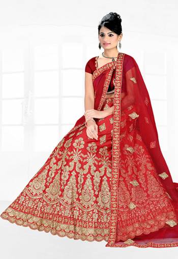 Get Ready For Your D-Day With This Very Beautiful And Evergreen Color For A Bridal Wear With This Designer Lehenga Choli In Red Color. This Heavy Embroidered Lehenga Choli Is Satin Silk Based Paired With Net Fabricated Dupatta. Its Lovely Bright Color And Heavy Embroidery Will Add Pretty Glam Look.