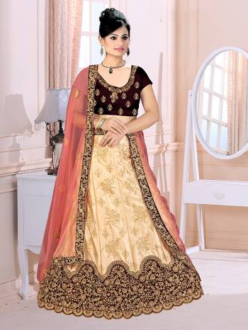 Go Colorful With This Heavy Designer Lehenga Choli For Your Bridal Wear In Brown Colored Blouse Paired With Cream Colored Lehenga And Pink Colored Dupatta. This Lehenga Choli IS Fabricated On Satin Silk Paired With Net Fabricated Dupatta. 