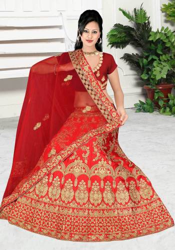 Get Ready For Your D-Day With This Very Beautiful And Evergreen Color For A Bridal Wear With This Designer Lehenga Choli In Red Color. This Heavy Embroidered Lehenga Choli Is Satin Silk Based Paired With Net Fabricated Dupatta. Its Lovely Bright Color And Heavy Embroidery Will Add Pretty Glam Look.