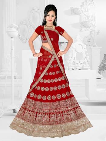 Get Ready For Your D-Day With This Very Beautiful And Evergreen Color For A Bridal Wear With This Designer Lehenga Choli In Red Color. This Heavy Embroidered Lehenga Choli Is Satin Silk Based Paired With Net Fabricated Dupatta. Its Lovely Bright Color And Heavy Embroidery Will Add Pretty Glam Look.